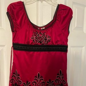 Very pretty red blouse great for holiday parties!
